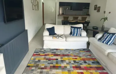 Apartamento praia grande com 3 dormitórios sendo 2 suítes,2 vagas de garagem,varanda gourmet com churrasqueira,sala 2 ambientes