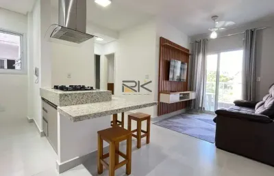 Apartamento praia grande com 2 dormitórios sendo 1 suíte,1 vaga de garagem,varanda gourmet com churrasqueira