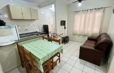 Apartamento praia grande com 2 dormitórios sendo 1 suíte,1 vaga de garagem,sala 2 ambientes,60 metros da orla