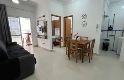 Apartamento à venda nas toninhas com 1 dormitórios, varanda gourmet com churrasqueira e piscina