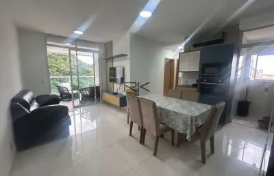 Apartamento nas toninhas com 2 dormitórios sendo 1 suíte,sala 2 ambientes,varanda gourmet com churrasqueira
