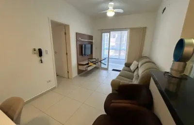 Apartamento nas toninhas com 2 dormitórios sendo 1 suíte,sala 2 ambientes,varanda gourmet com churrasqueira