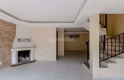 Casa residencial com 3 dormitórios suítes, no bairro tristeza