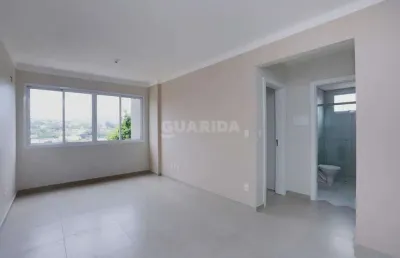 Apartamento com 2 dormitórios, 1 suíte e 2 vagas de garagem no bairro petrópolis