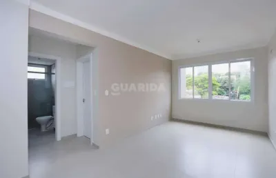 Apartamento com 2 dormitórios, 1 suíte e 2 vagas de garagem no bairro petrópolis