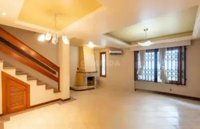 Casa em condominio fechado com 3 dormitórios, sendo 1 suíte, para alugar no bairro cristal.