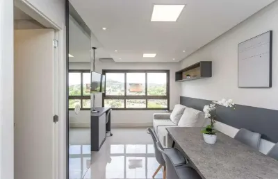 Apartamento estilo loft mobiliado com 1 vaga de garagem no bairro jardim botânico
