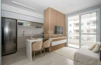 Apartamento mobiliado com 2 dormitórios, sendo 1 suíte, no bairro humaitá com vaga/sacada e churrasqueira interna!