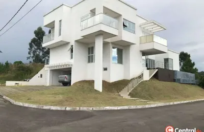 Casa à venda com 4 suítes e 4 vagas de garagens por r$ 3.000.000,00 - camboriú/s