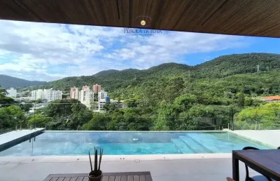 Casa em condomínio fechado com 4 quartos à venda na Rodovia Admar Gonzaga, 3180, Itacorubi, Florianópolis