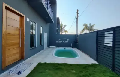 Excelente sobrado com 3 dormitorios, piscina, no bairro itajuba em barra velha a apenas 900m do mar!
