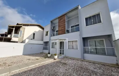 Excelente apartamento próximo a praia com duas vagas de garagem descobertas.