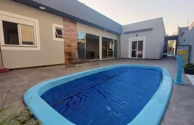 Casa com 4 quartos à venda na rua república do piratini, 135, jardim dos lagos, guaíba por r$ 898.000