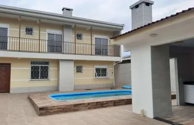 Casa com 4 quartos à venda na rua província de são pedro, 144, jardim dos lagos, guaíba por r$ 620.000