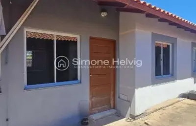 Casa em condomínio fechado com 2 quartos à venda na rua quinze, 591, vila pedras brancas, guaíba por r$ 200.000