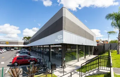 Loja 22 com 110,00 m² para alugar no centro comercial vila lamu no novo mundo em curitiba
