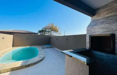 Sobrado contendo 3 dormitórios - espaço gourmet com churrasqueira e piscina.