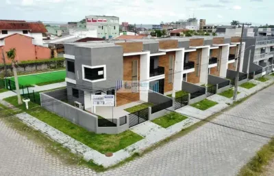 Sobrado em excelente localização - 3 dormitórios sendo uma suíte - prox. ao mar