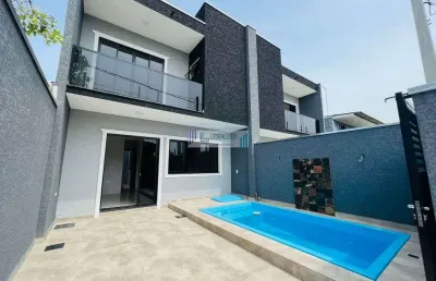 Sobrado contendo 3 dormitórios - espaço gourmet com churrasqueira e piscina.