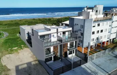 Triplex contendo 3 dormitórios - suíte - terraço gourmet com vista para o mar.