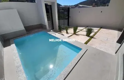Sobrado novo luxo com 03 suítes e piscina localizado em camboriú - sc