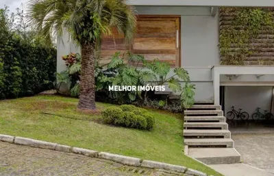 Horizontal praia brava - casa em condomínio fechado á venda com 4 suítes,  2 vagas localizado na praia brava.