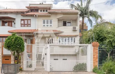 Casa com 3 quartos à venda na rua professor isidoro la porta, 112, jardim planalto, porto alegre por r$ 1.600.000