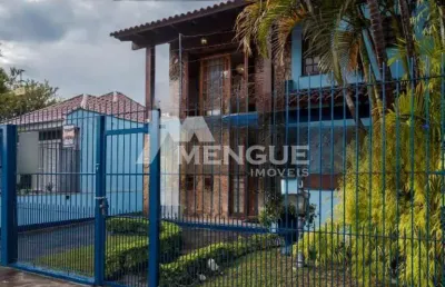 Casa com 4 quartos à venda na rua ararás, 344, sarandi, porto alegre por r$ 1.200.000