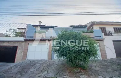 Casa com 3 quartos à venda na rua arnaldo ballve, 705, jardim itu sabará, porto alegre por r$ 600.000