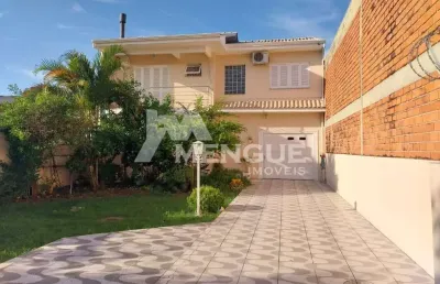Casa em condomínio fechado com 4 quartos à venda na rua tapirapés, 184, sarandi, porto alegre por r$ 1.063.829