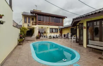 Casa com 4 quartos à venda na travessa porto príncipe, 59, jardim lindóia, porto alegre por r$ 1.650.000