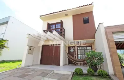 Casa em condomínio fechado com 3 quartos à venda na rua deputado hugo mardini, 1780, passo das pedras, porto alegre por r$ 878.000