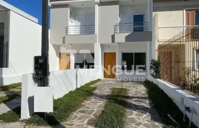 Casa com 3 quartos à venda na rua itacyr rossi, 195, guarujá, porto alegre por r$ 499.000