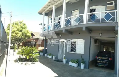 Casa com 5 quartos à venda na avenida souza melo, 970, sarandi, porto alegre por r$ 490.000