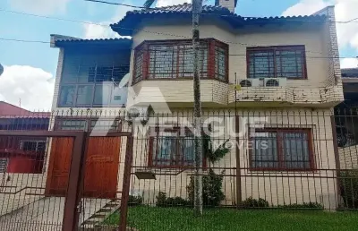 Casa com 3 quartos à venda na rua general telino chagastelles, 245, parque santa fé, porto alegre por r$ 1.200.000