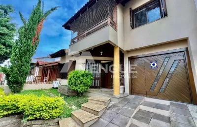 Casa com 4 quartos à venda na rua juruá, 105, cristo redentor, porto alegre por r$ 1.190.000