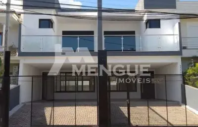 Casa com 3 quartos à venda na rua lagoa do peixe, 95, ecoville, porto alegre por r$ 980.000