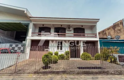 Casa com 3 quartos à venda na avenida vinte e um de abril, 62, sarandi, porto alegre por r$ 850.000