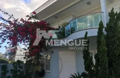 Casa com 5 quartos à venda na rua zeferino dias, 964, sarandi, porto alegre por r$ 875.000