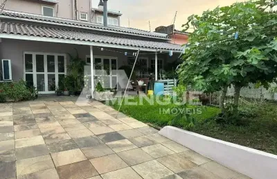 Casa com 3 quartos à venda na rachell wolfrid, 65, alto petrópolis, porto alegre por r$ 699.000