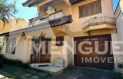 Casa com 3 quartos à venda na rua josé carlos de souza lobo, 142, parque santa fé, porto alegre por r$ 630.000