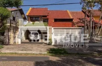 Casa com 4 quartos à venda na rua doutor paulino guerra, 575, jardim itu sabará, porto alegre por r$ 1.298.000