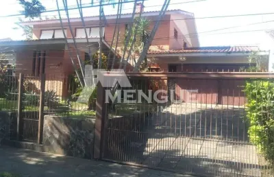 Casa com 4 quartos à venda na rua alfredo miranda obino, 190, jardim itu sabará, porto alegre por r$ 1.279.000
