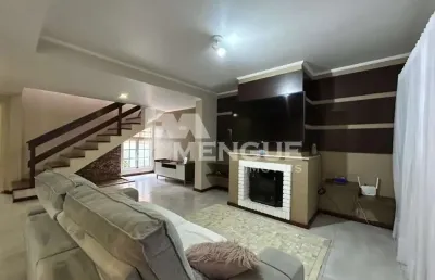 Casa com 3 quartos à venda na rua rudi schaly, 315, parque santa fé, porto alegre por r$ 740.000