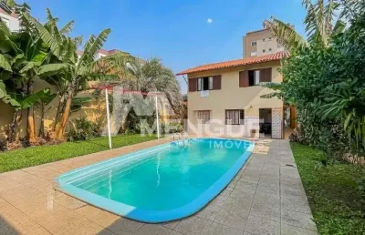 Casa com 4 quartos à venda na rua fernando cortez, 476, cristo redentor, porto alegre por r$ 1.170.000