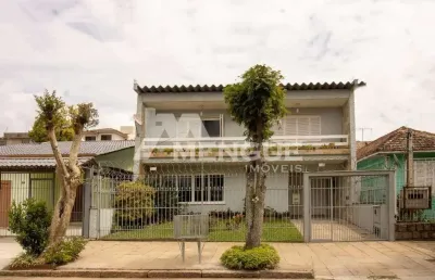 Casa com 4 quartos à venda na rua arnaldo ballve, 555, jardim itu sabará, porto alegre por r$ 959.000