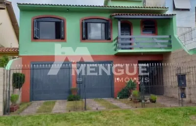 Casa com 3 quartos à venda na avenida sargento manoel raymundo soares, 161, jardim carvalho, porto alegre por r$ 833.000