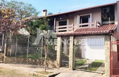 Casa com 4 quartos à venda na rua doutor ricardo gavenski, 235, sarandi, porto alegre por r$ 990.000