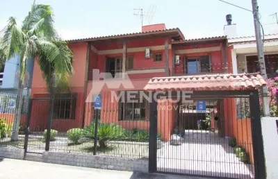 Casa com 4 quartos à venda na rua dom jaime de barros câmara, 276, sarandi, porto alegre por r$ 950.000