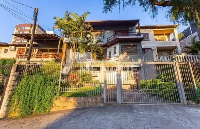 Casa com 6 quartos à venda na rua fernando abbott, 1055, cristo redentor, porto alegre por r$ 1.300.000